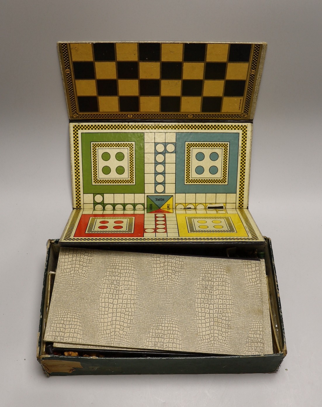 A Staunton pattern boxwood and ebony chess set, kings 7.5cm high and a boxed games compendium